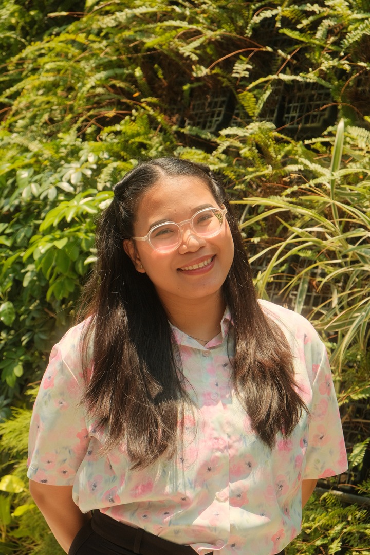 Mary Clarice Lopez smiling outdoors